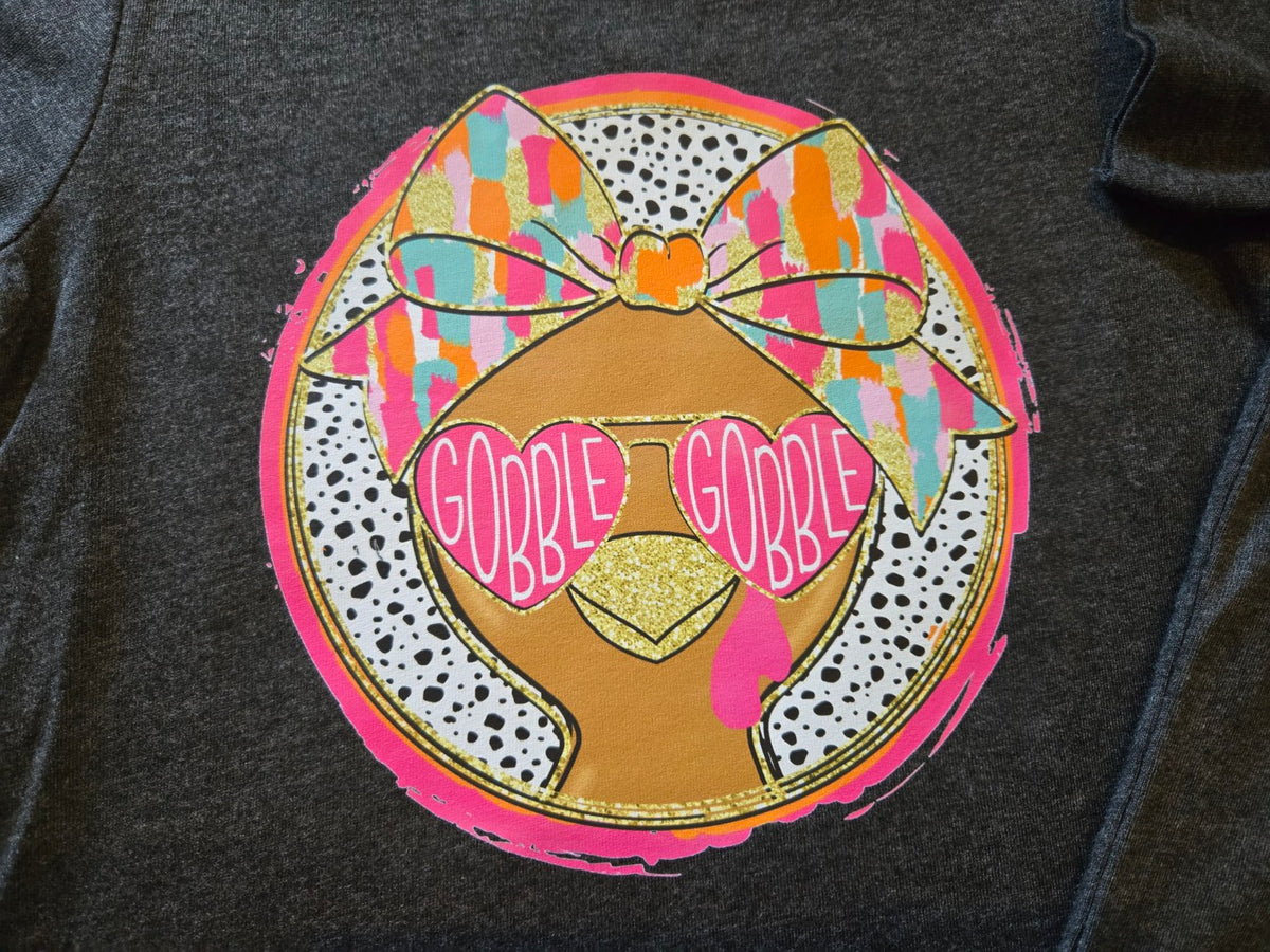Girl Gobble Gobble turkey design with colorful bow and pink heart sunglasses