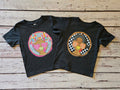 Two dark heather toddler short sleeve tees with girl and boy Gobble Gobble turkey designs