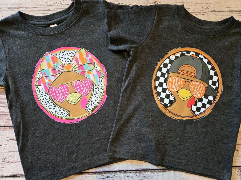 Girl and boy Gobble Gobble toddler tees side by side