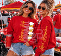 Kansas City Football Red Kingdom red crewneck sweatshirt with front football design and sleeve lettering