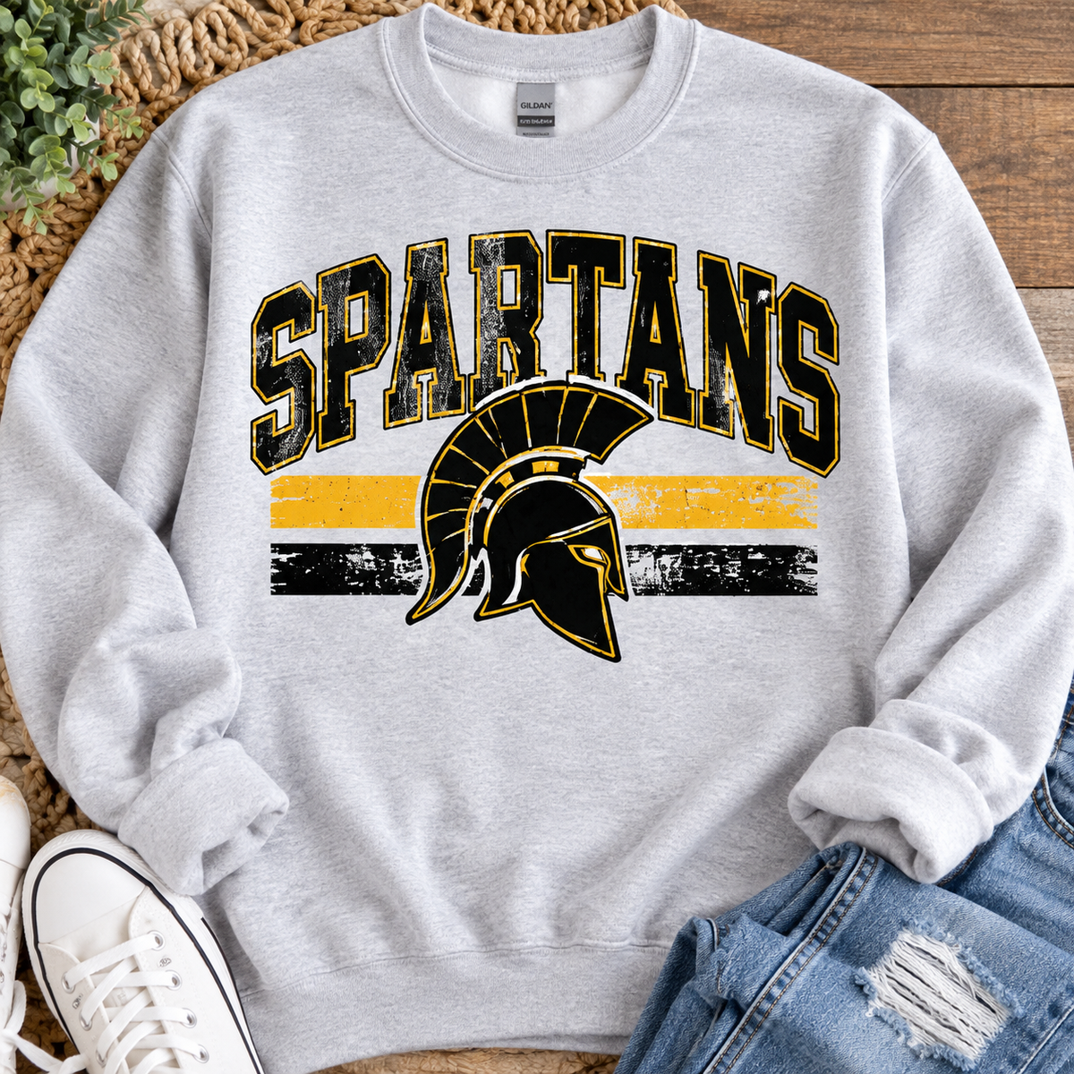 Spartans black and gold helmet design on Gildan youth crewneck